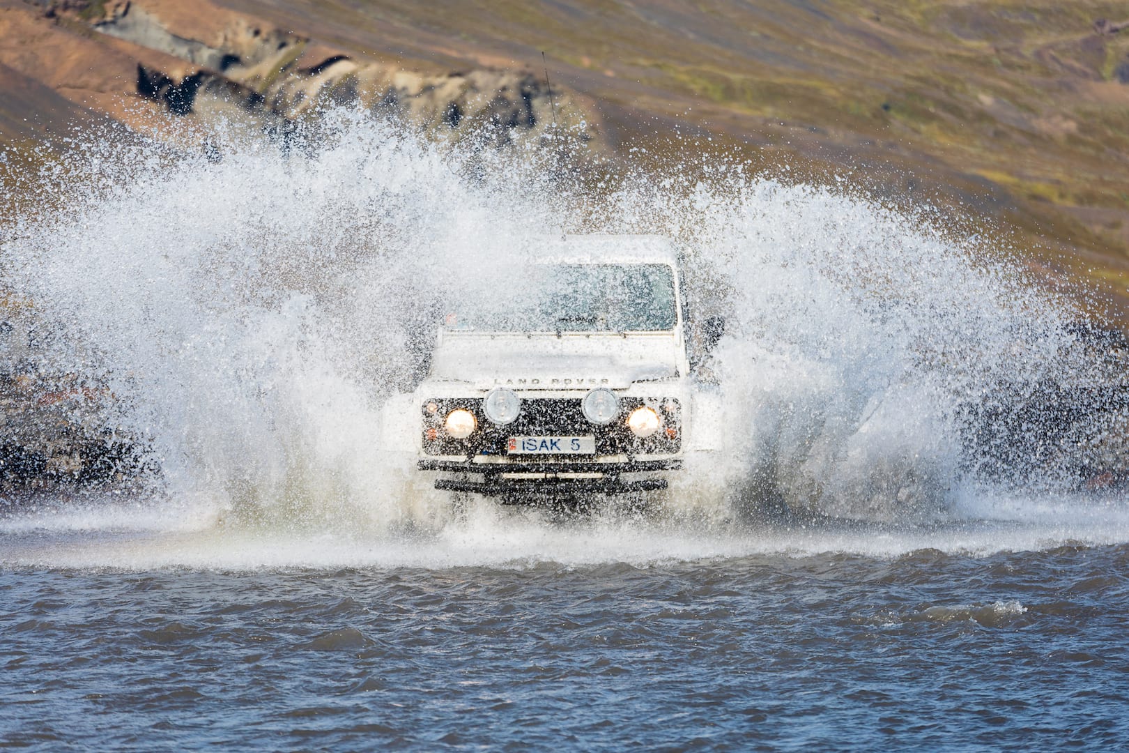 Superjeep crossing a river