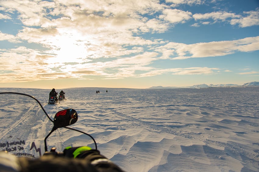 Snow mobiling Vatnajokull glacier Iceland