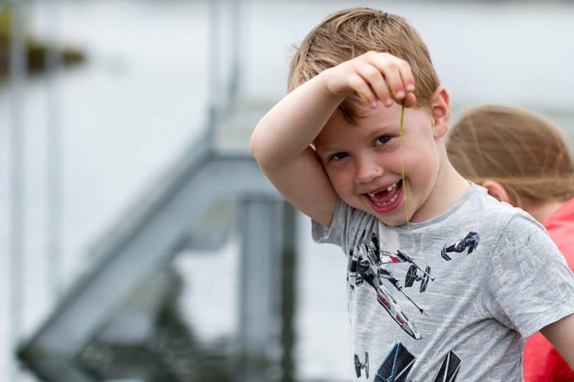 Cute young child enjoying the Icelandic summer